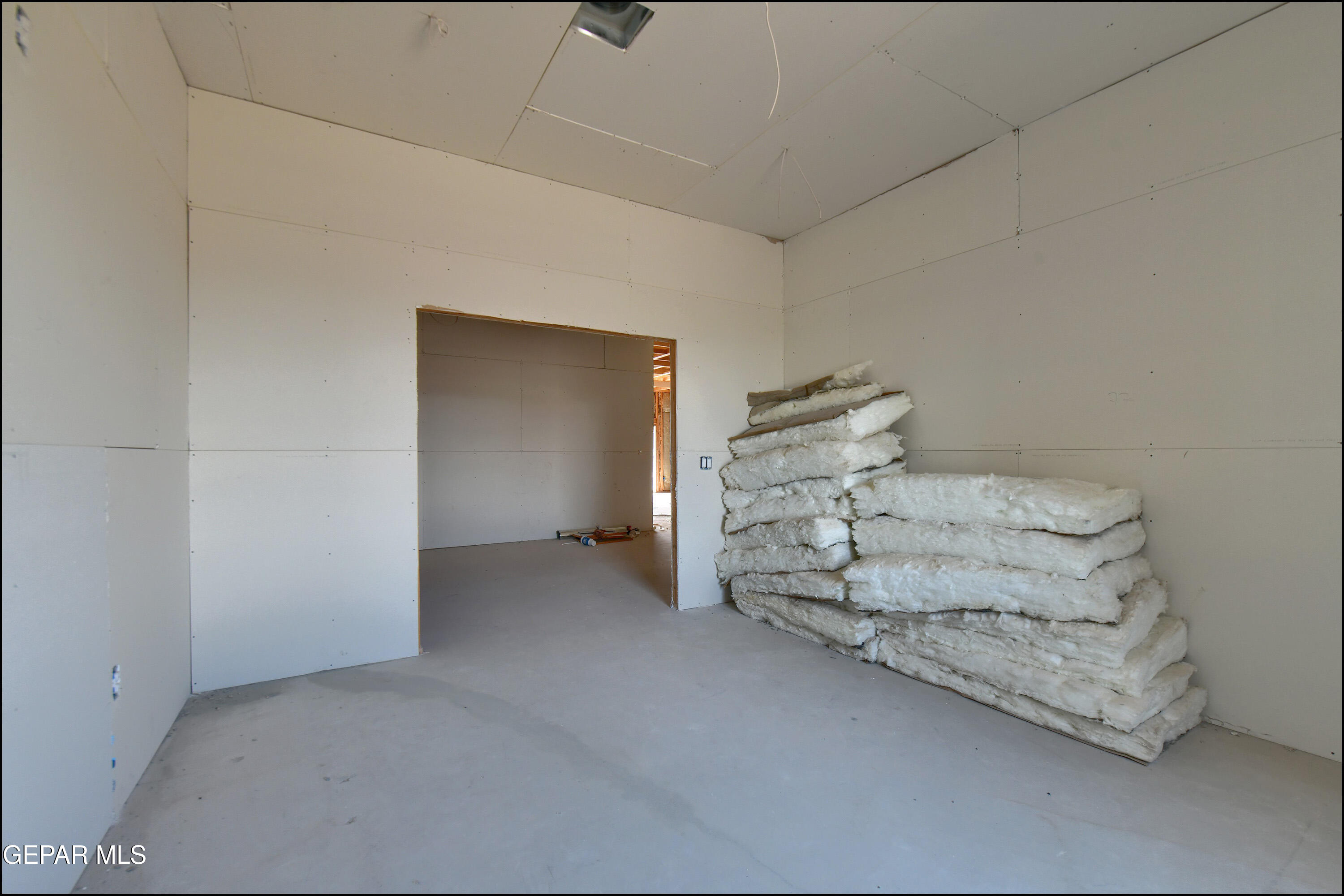 13360 Ayla Road El Paso, TX 79938 - Photo 23 of 48 a spacious bedroom with a bed and window