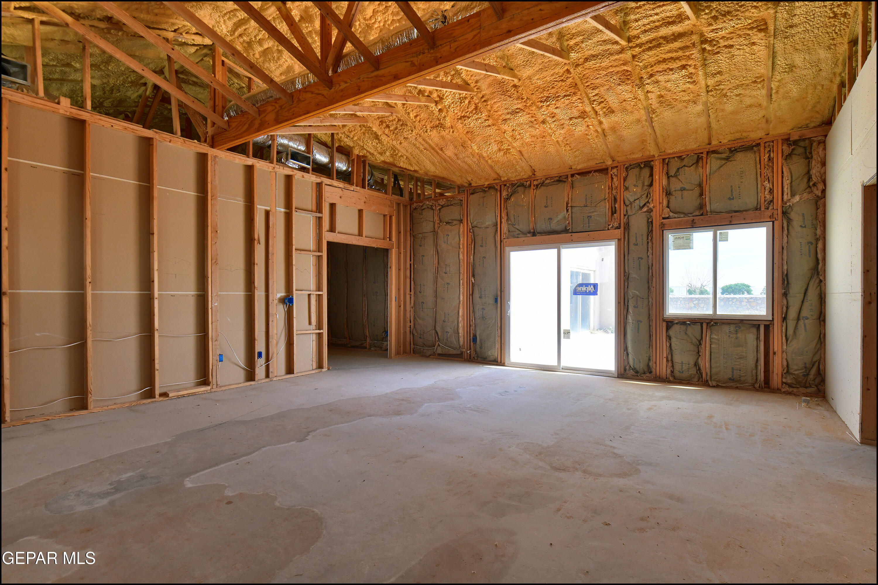 13360 Ayla Road El Paso, TX 79938 - Photo 28 of 48 a view of an empty room with a window
