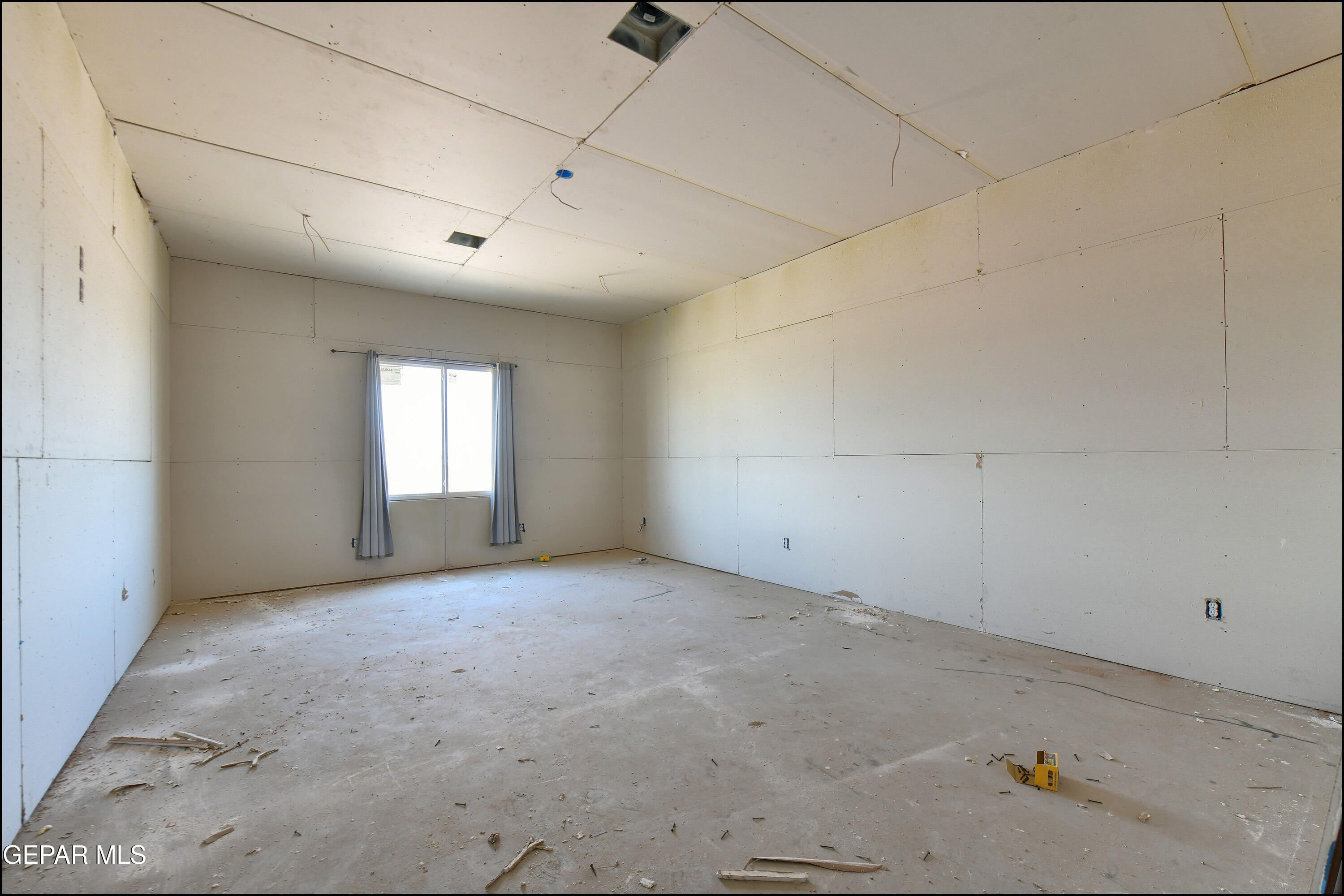13360 Ayla Road El Paso, TX 79938 - Photo 32 of 48 a view of an empty room with a window