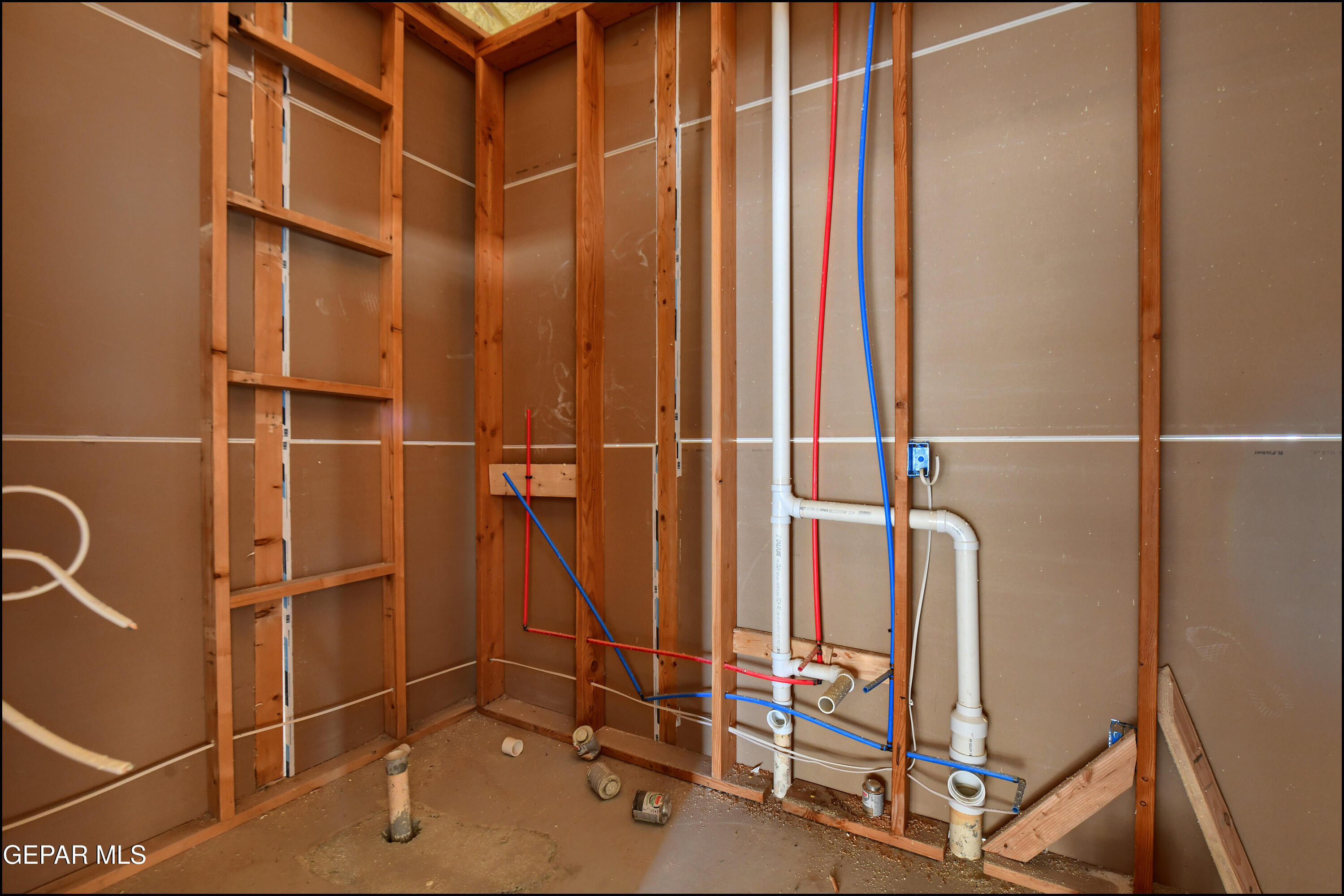 13360 Ayla Road El Paso, TX 79938 - Photo 39 of 48 a view of a room with rack on the wall