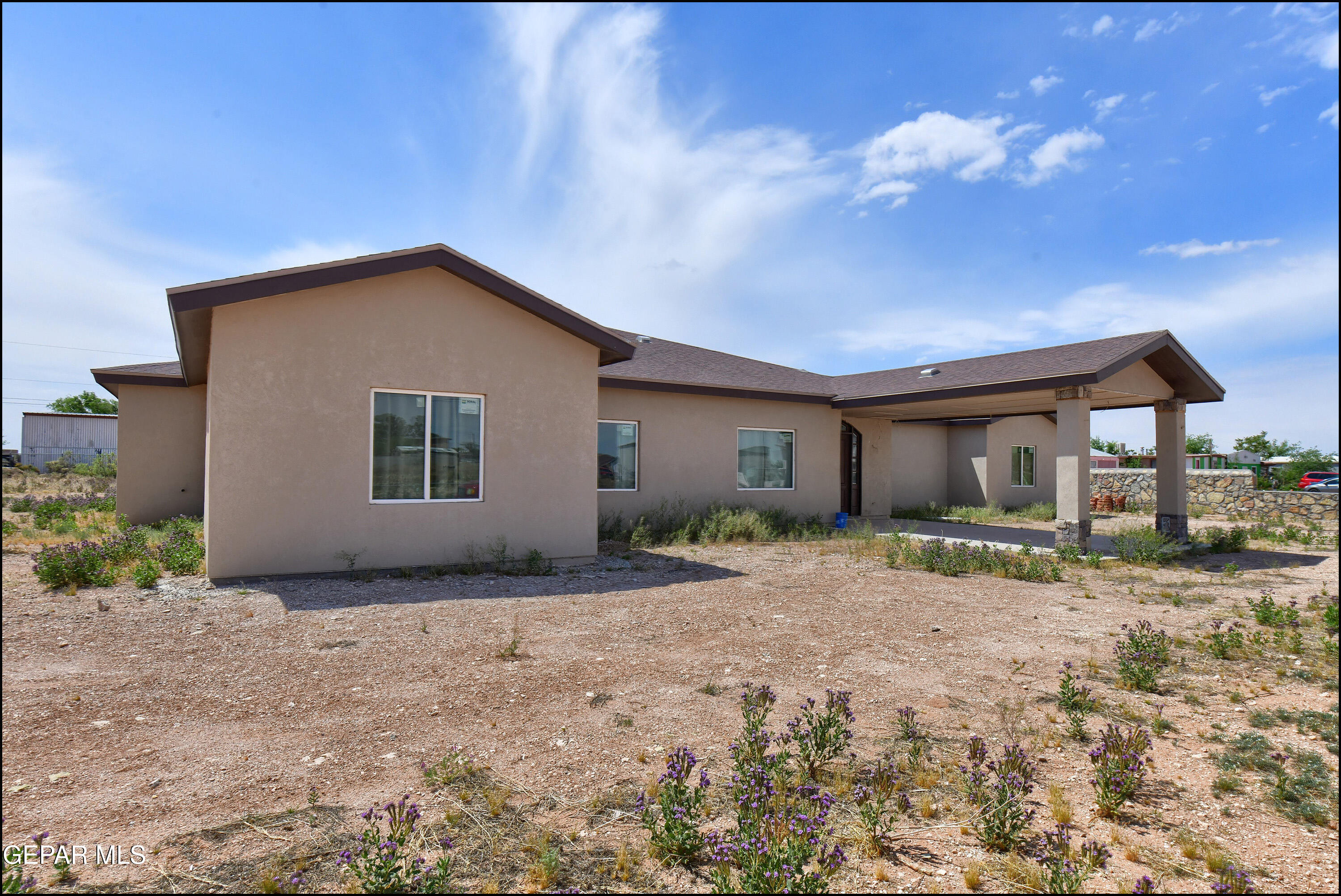 13360 Ayla Road El Paso, TX 79938 - Photo 4 of 48 a view of a house with backyard and garden