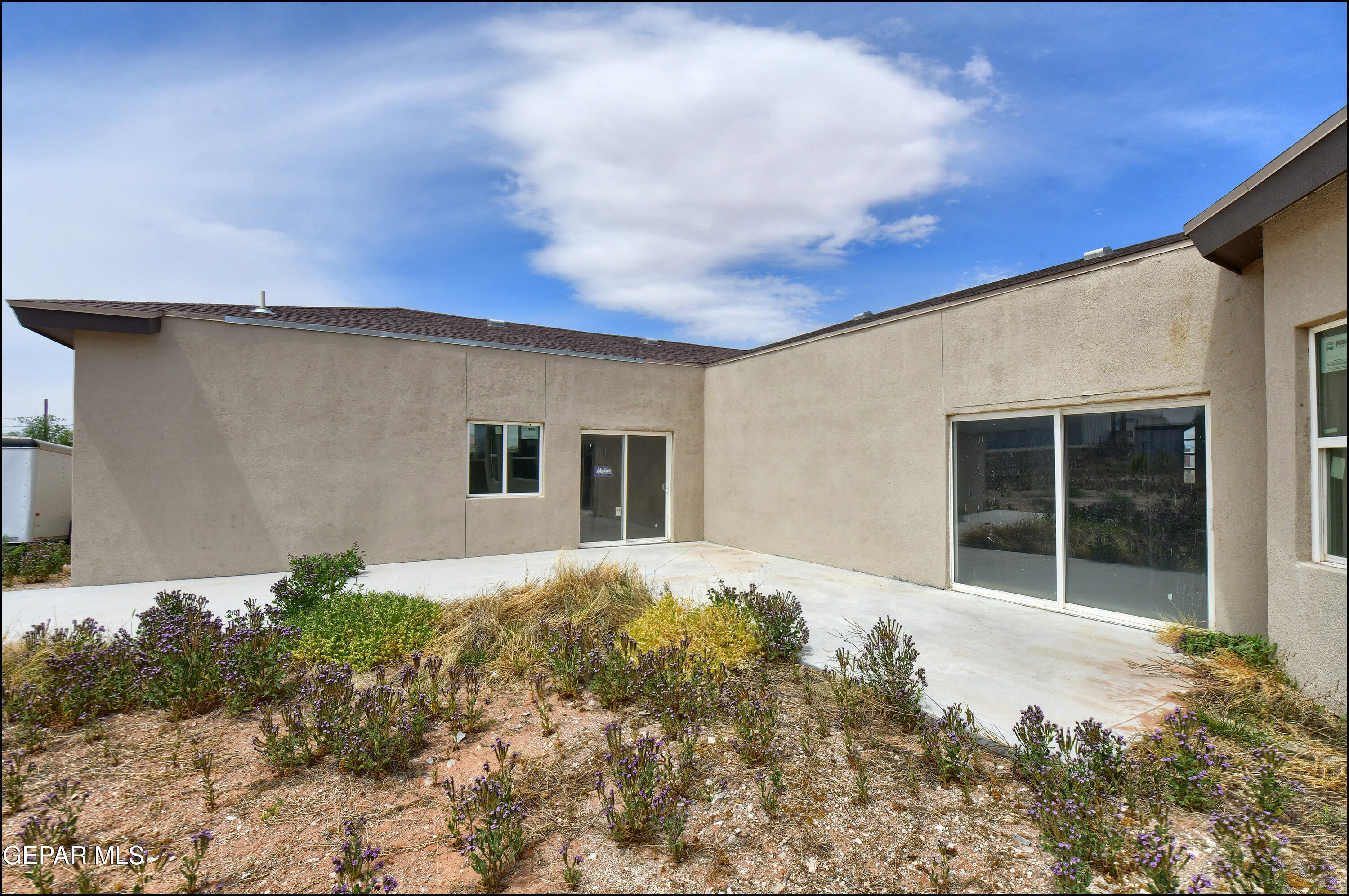 13360 Ayla Road El Paso, TX 79938 - Photo 43 of 48 a front view of a house with a yard