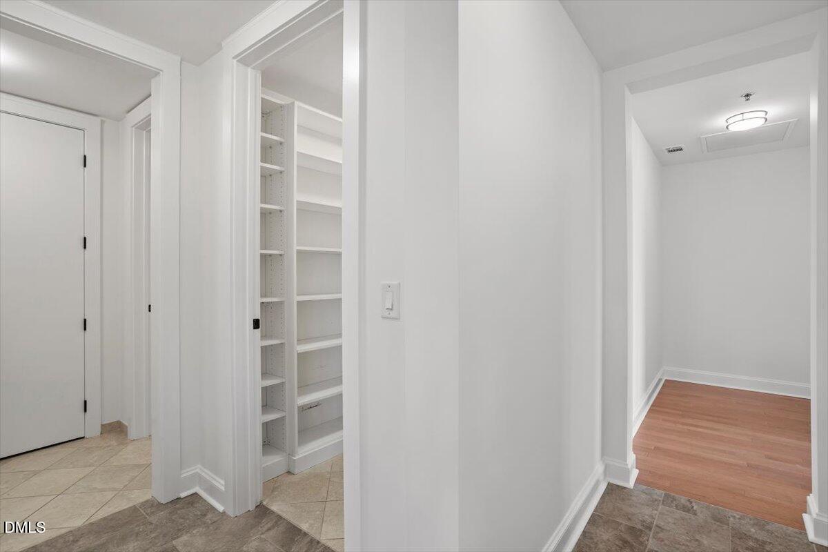 618 North Boylan Avenue, Unit 924 Raleigh, NC 27603 - Photo 17 of 33 a view of closet area with empty racks