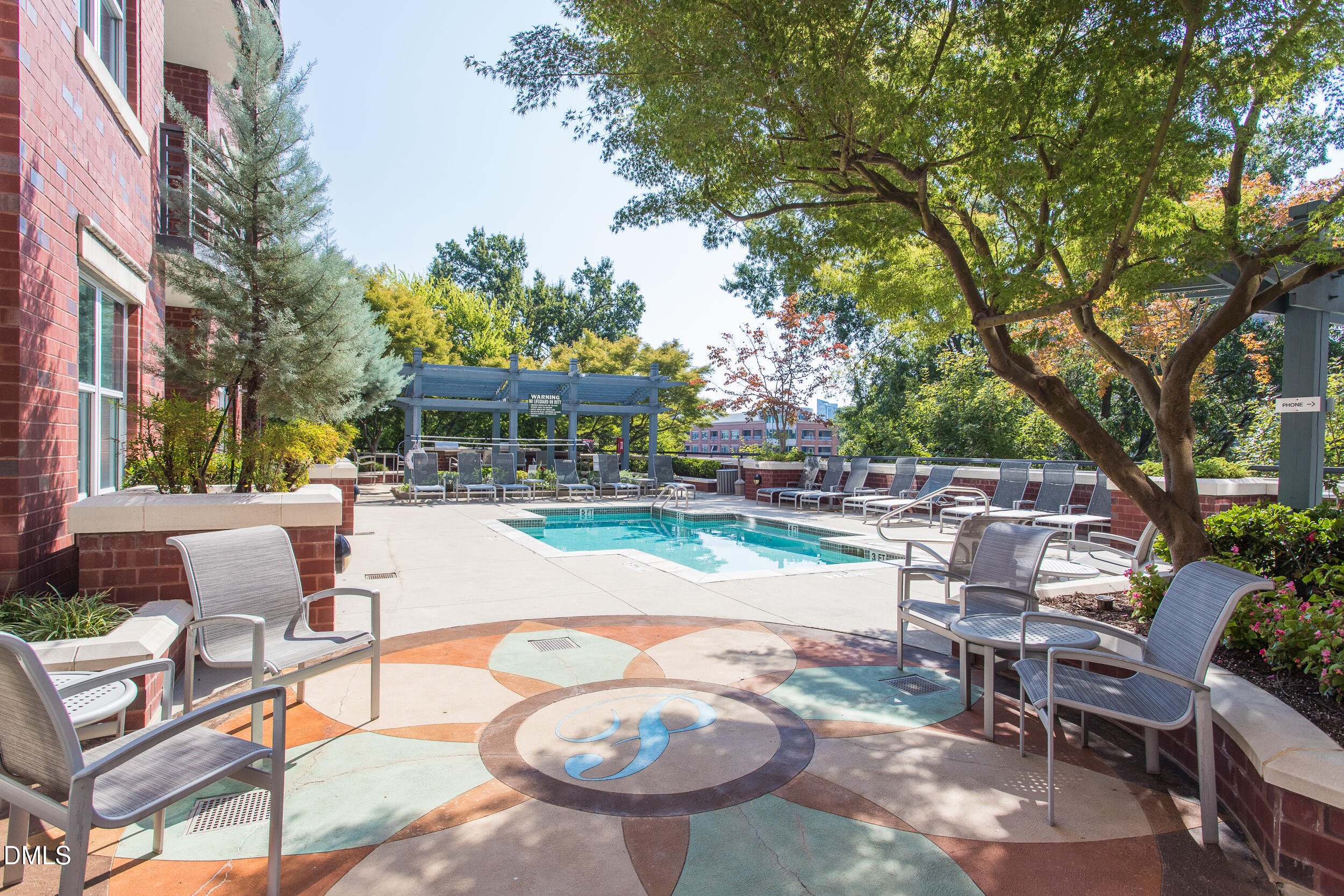 618 North Boylan Avenue, Unit 924 Raleigh, NC 27603 - Photo 22 of 33 a view of a swimming pool with outdoor seating