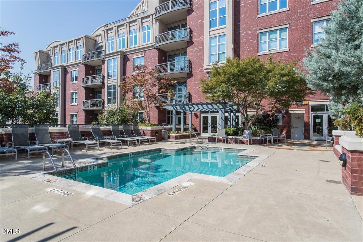 618 North Boylan Avenue, Unit 924 Raleigh, NC 27603 - Photo 23 of 33 a view of a building with a swimming pool