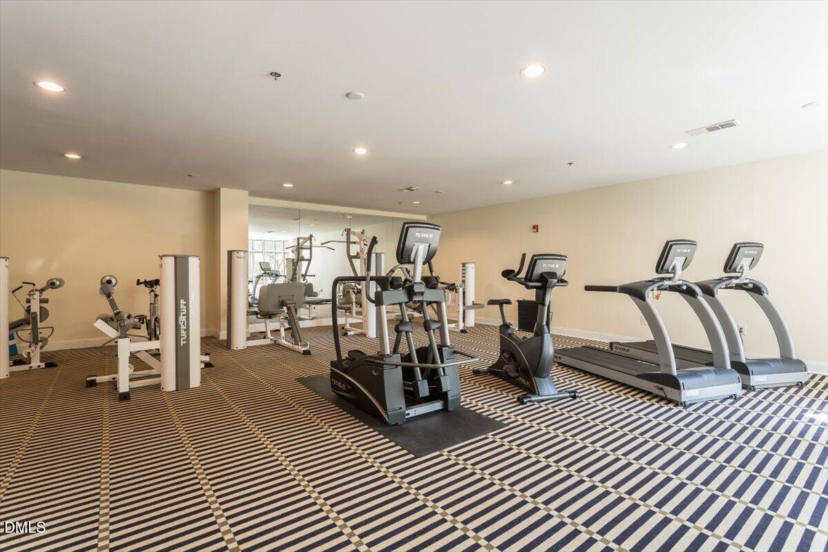 618 North Boylan Avenue, Unit 924 Raleigh, NC 27603 - Photo 29 of 33 a very nice looking room with lots of chairs