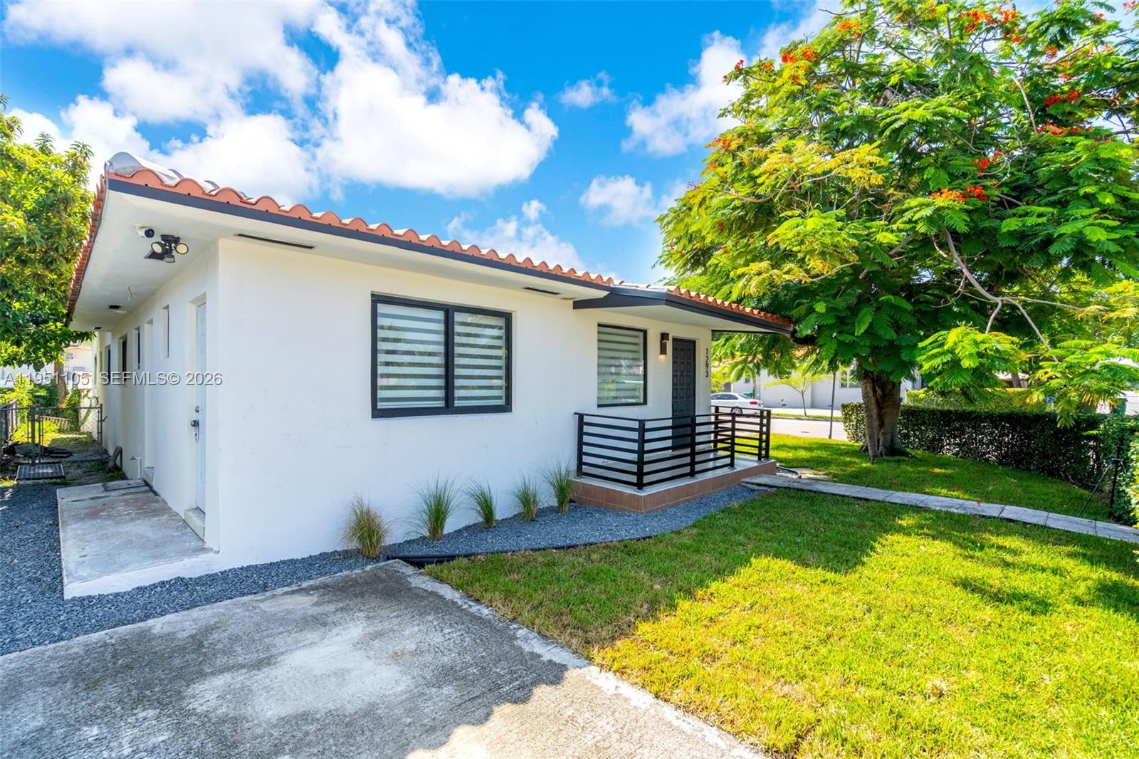 1293 Southwest 22nd Avenue Miami, FL 33135 - Photo 4 of 56 a view of a backyard with a garden