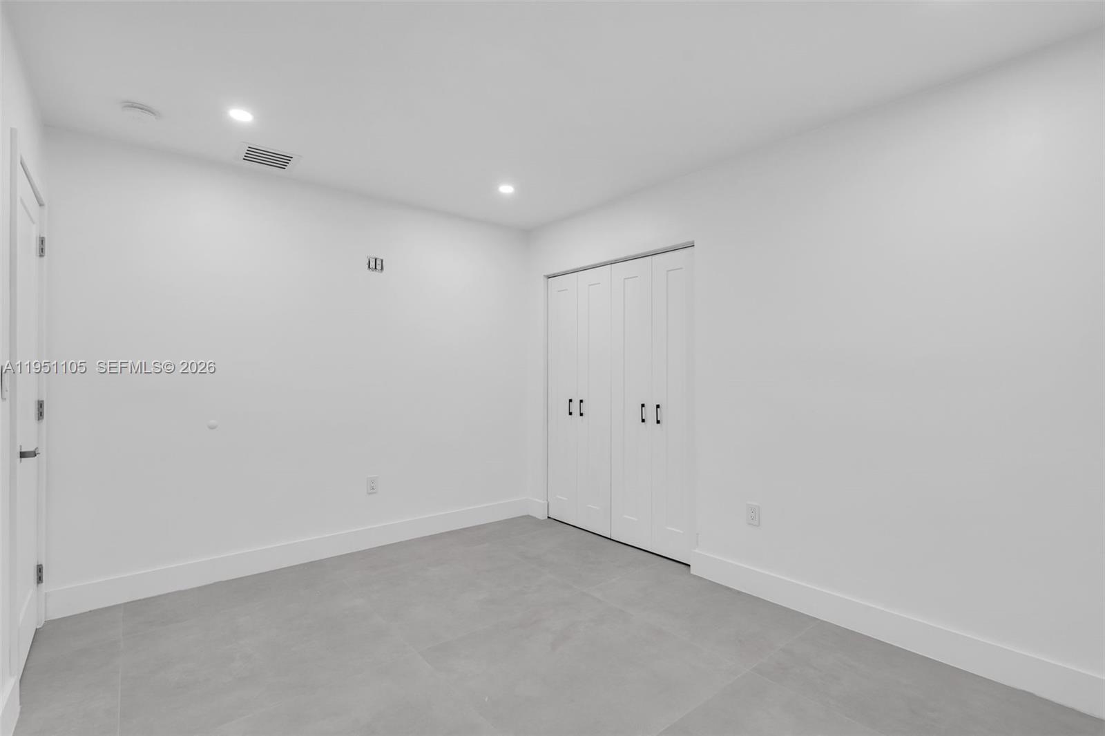 1293 Southwest 22nd Avenue Miami, FL 33135 - Photo 44 of 56 a view of an empty room