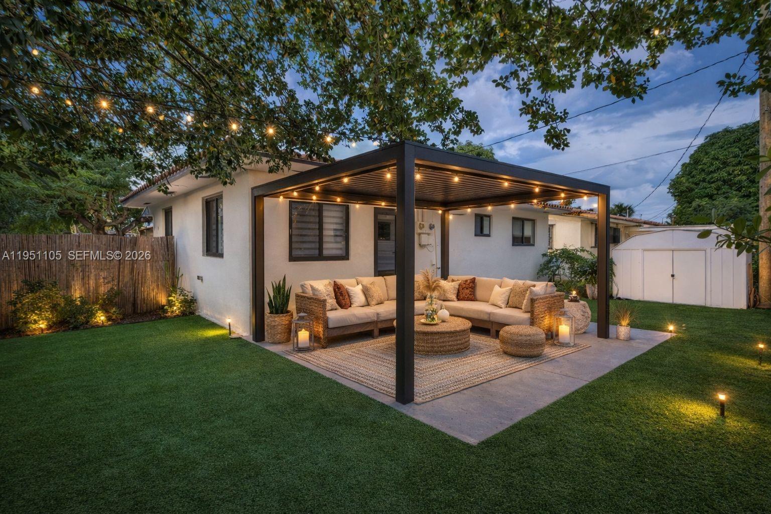 1293 Southwest 22nd Avenue Miami, FL 33135 - Photo 47 of 56 a front view of a house with garden