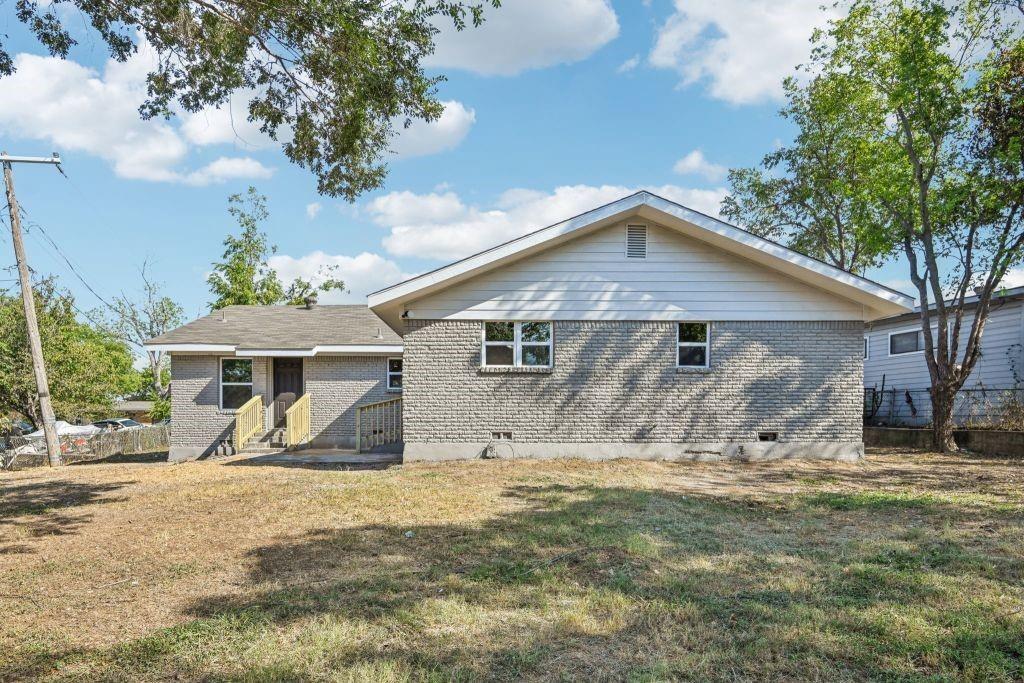 1804 Ransom Terrace Fort Worth, TX 76112 - Photo 3 of 9 a front view of a house with a yard