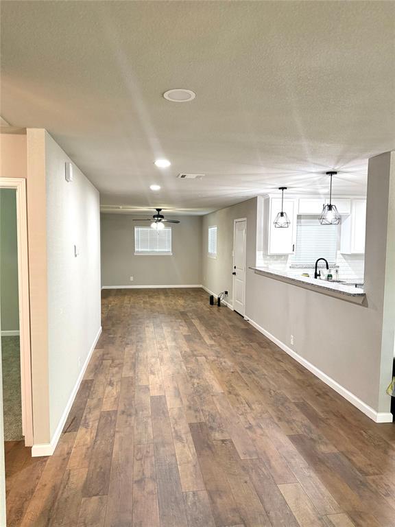 1804 Ransom Terrace Fort Worth, TX 76112 - Photo 6 of 9 a view of empty room with kitchen and window