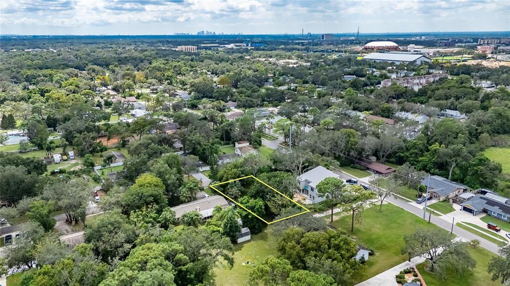 5204 East 131st Avenue Temple Terrace, FL 33617 - Photo 15 of 16 an aerial view of a house with a yard