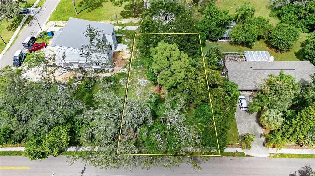 5204 East 131st Avenue Temple Terrace, FL 33617 - Photo 6 of 16 an aerial view of a house with a yard and garden