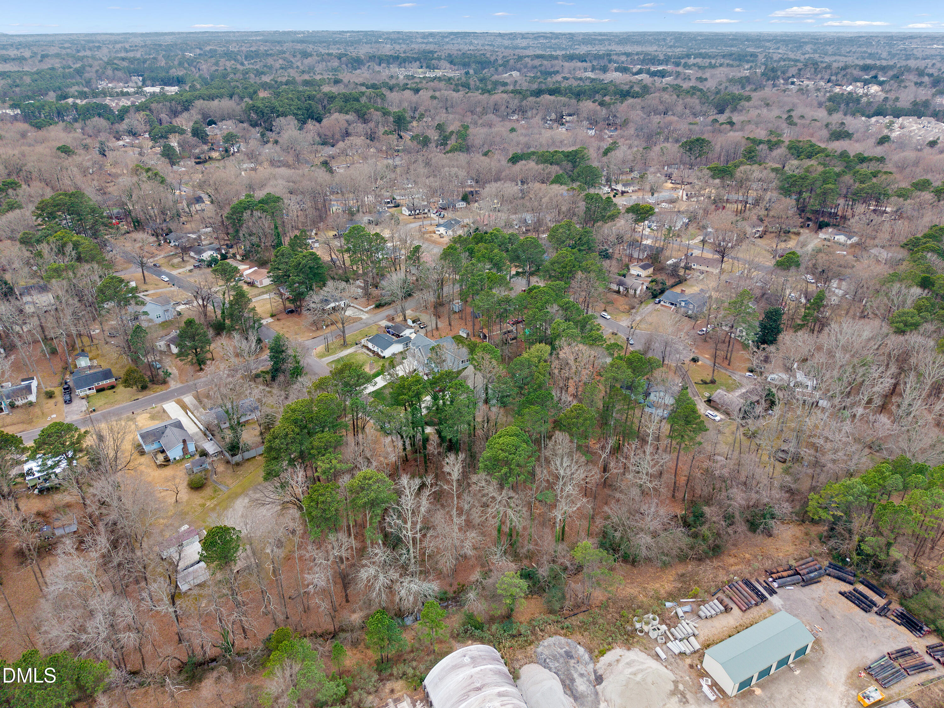 507 Maple Street Cary, NC 27513 - Photo 7 of 12 an aerial view of a house with a yard and mountain view in back