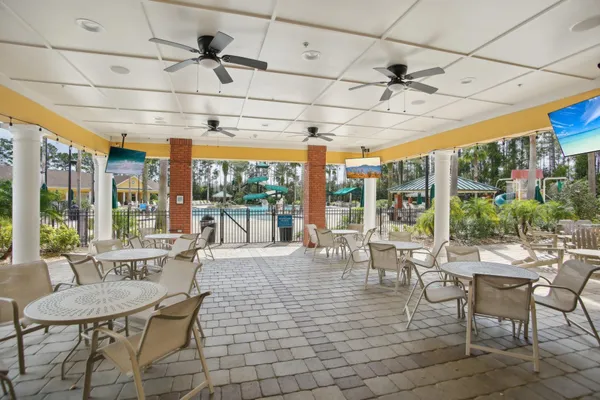 a living room with large windows