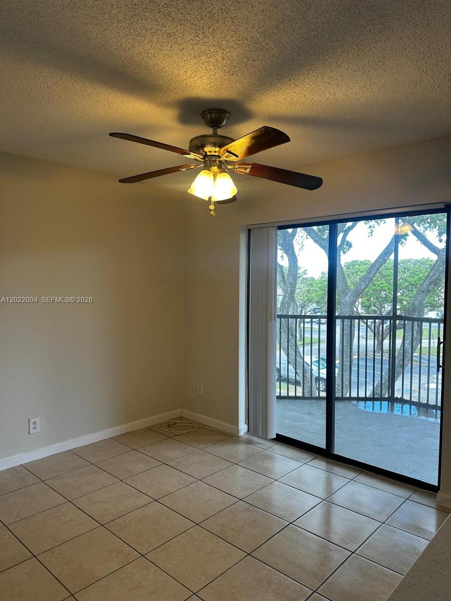 3400 Foxcroft Road, Unit 301 Miramar, FL 33025 - Photo 32 of 72 a view of an empty room and window