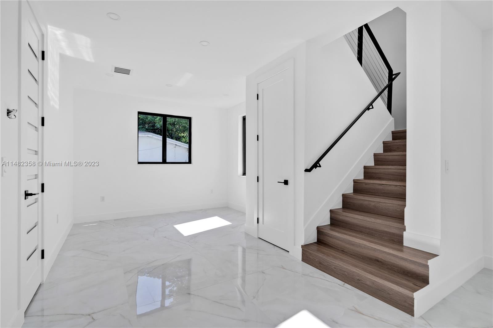 5241 Southwest 6th Street Miami, FL 33134 - Photo 16 of 38 a view of an entryway with staircase