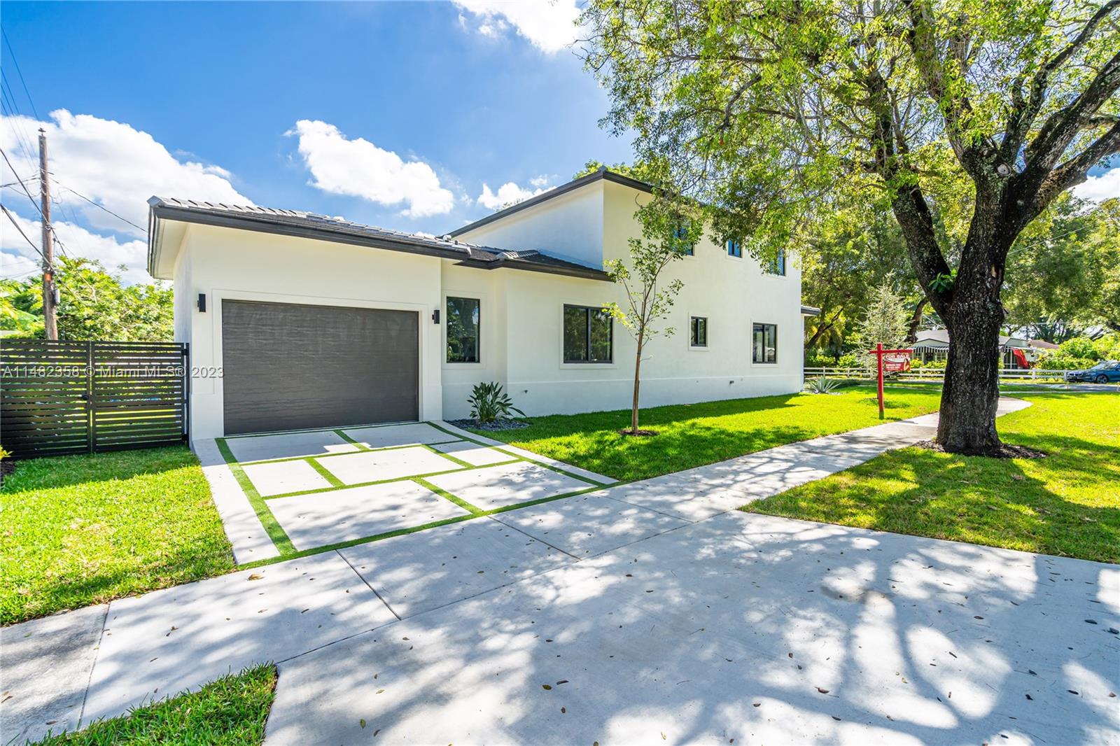 5241 Southwest 6th Street Miami, FL 33134 - Photo 5 of 38 a front view of a house with garden