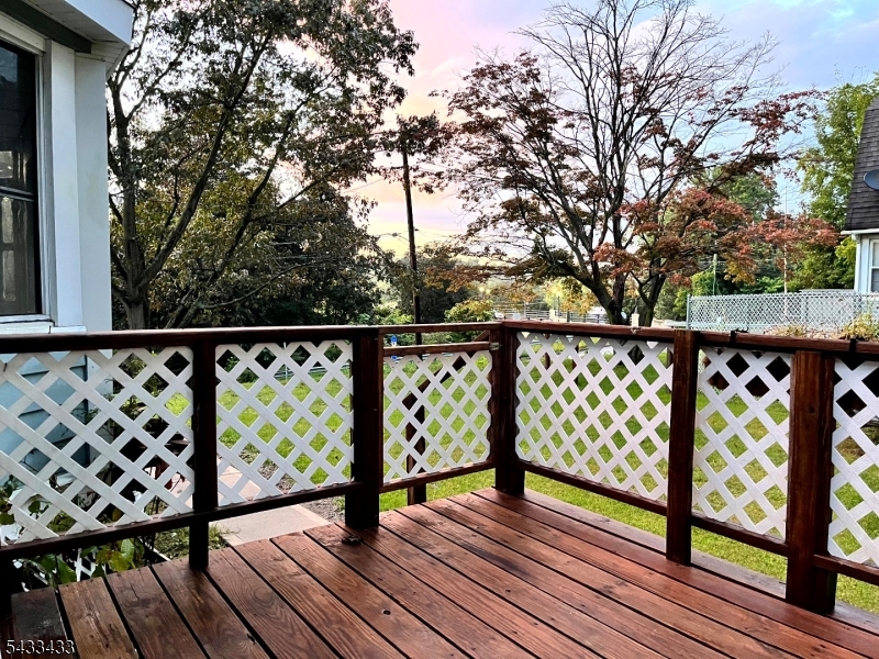 30 Fowler Street Franklin, NJ 07416 - Photo 25 of 27 a view of wooden deck with a trees