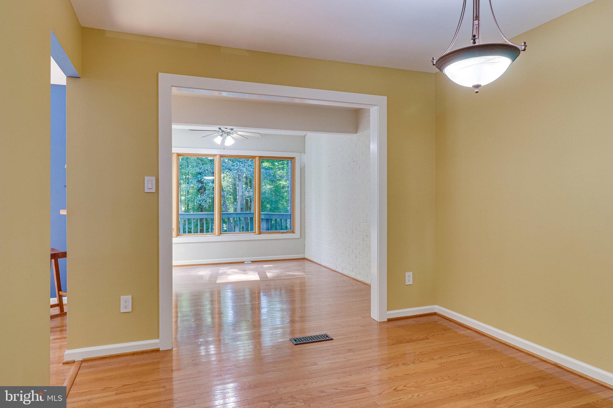 2210 Glencourse Lane Reston, VA 20191 - Photo 16 of 84 View thru Separate Dining Room into the Sun Room