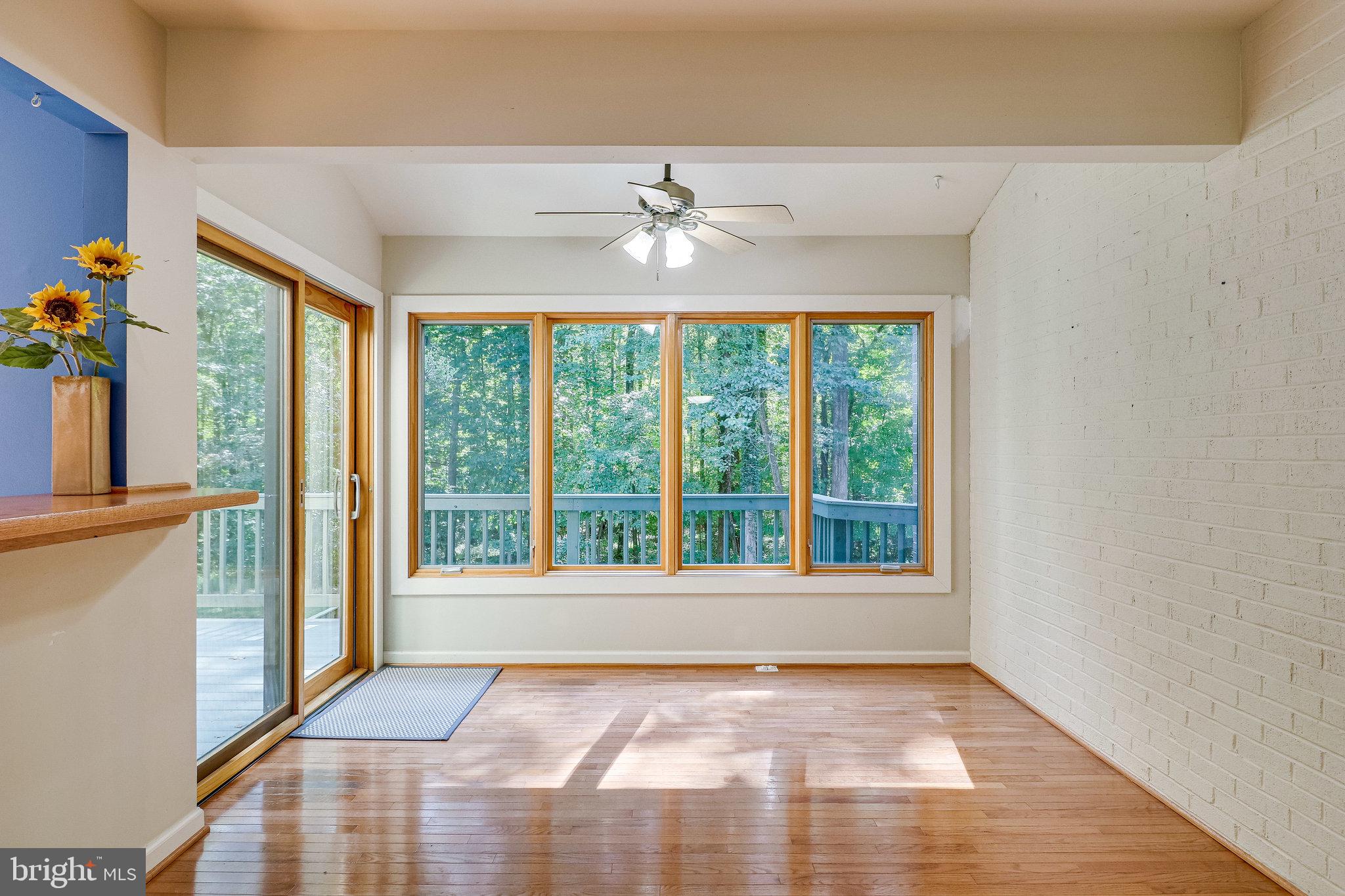 2210 Glencourse Lane Reston, VA 20191 - Photo 20 of 84 Ceiling Fan Lights & Circulates Air in Sun Room