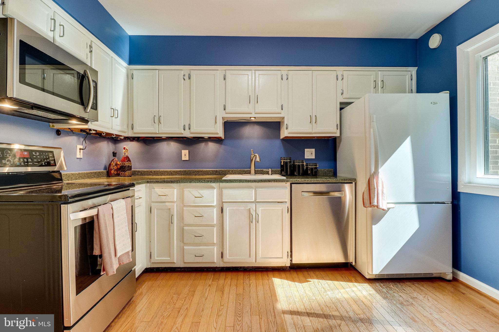 2210 Glencourse Lane Reston, VA 20191 - Photo 25 of 84 Sunlit Open Kitchen with Hardwood Flooring