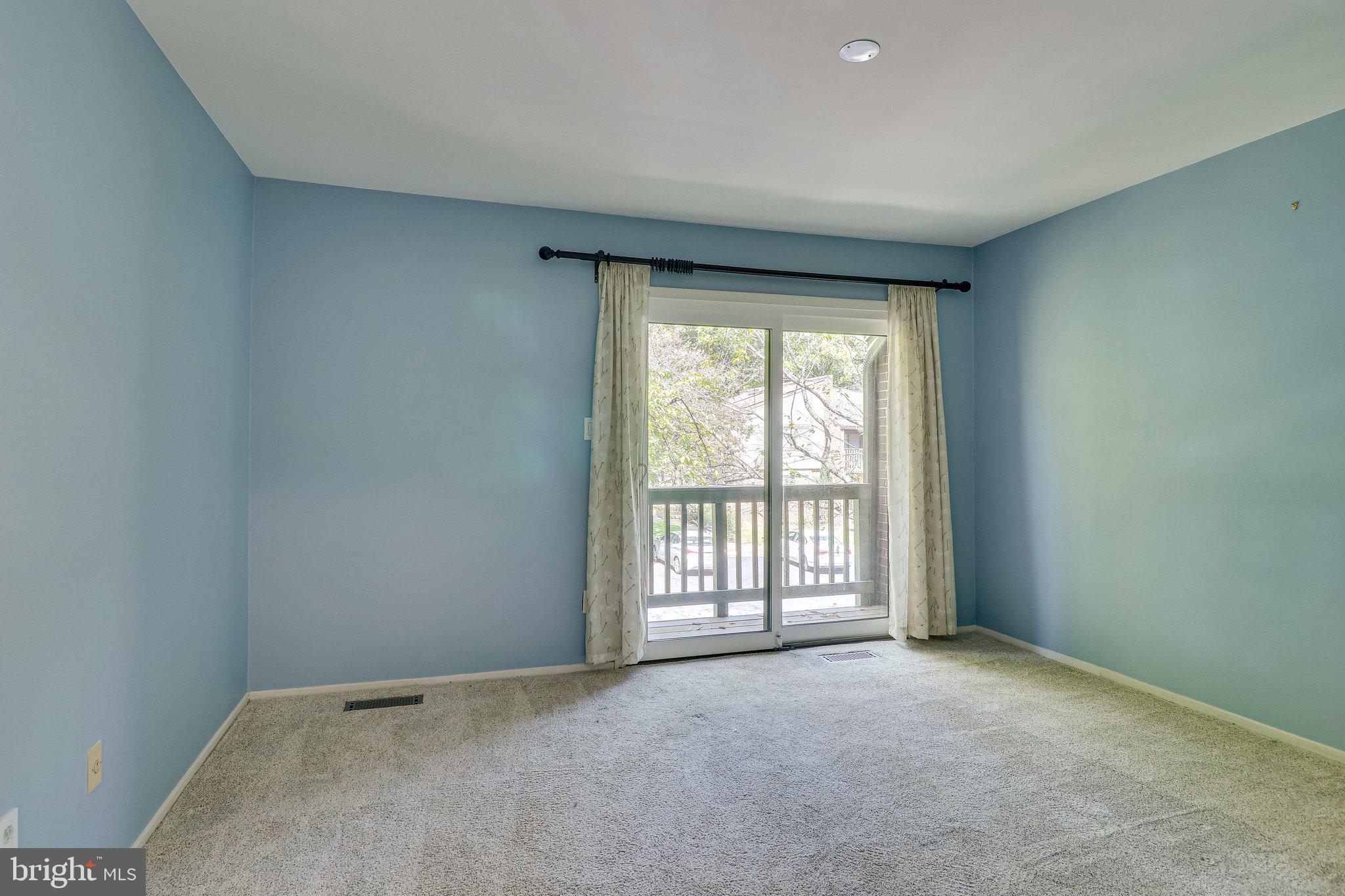 2210 Glencourse Lane Reston, VA 20191 - Photo 34 of 84 Master Bedroom with Front View Balcony