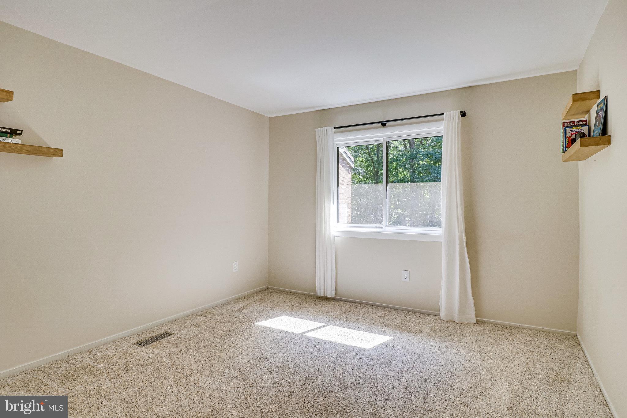 2210 Glencourse Lane Reston, VA 20191 - Photo 45 of 84 Another View of Second Bedroom Wall Shelving