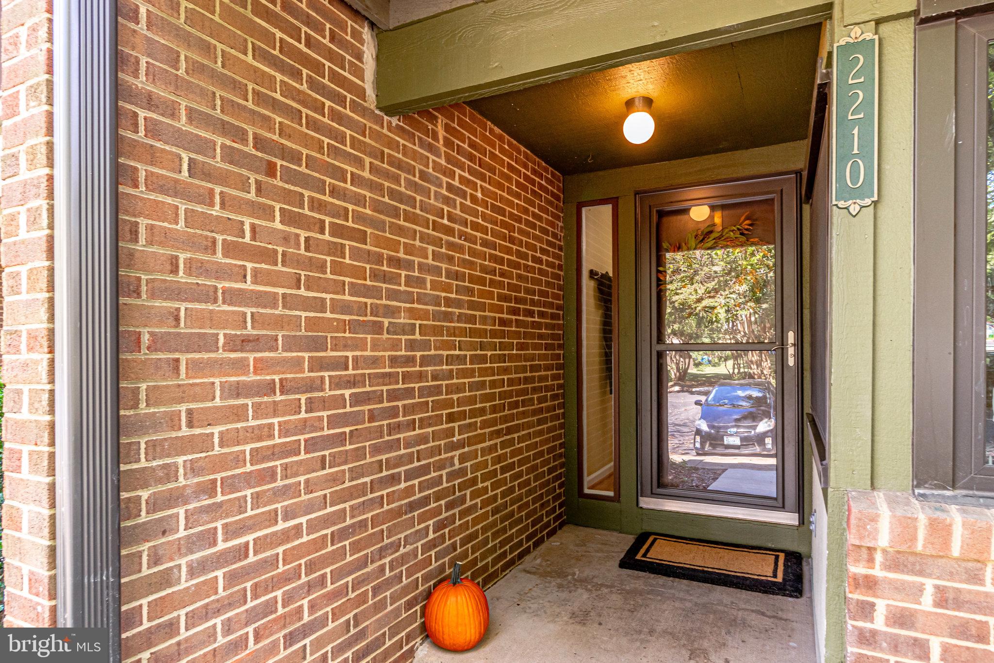2210 Glencourse Lane Reston, VA 20191 - Photo 7 of 84 Front Door Entrance with Glass Paneled Storm Door