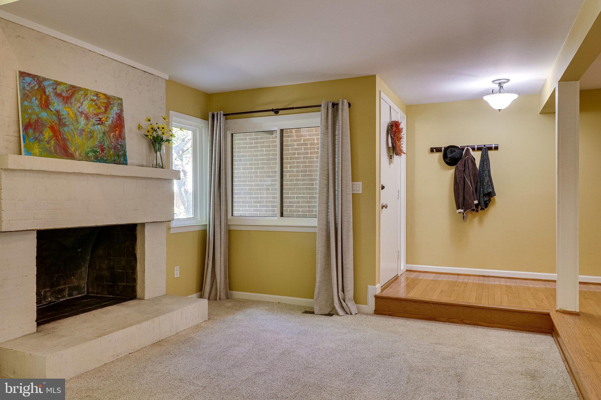 2210 Glencourse Lane Reston, VA 20191 - Photo 10 of 84 Painted Brick Wood Burning Fireplace with Mantel