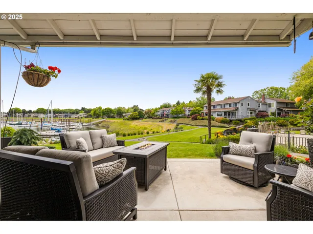 a view of swimming pool with outdoor seating