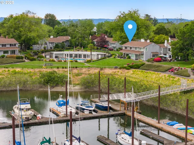 a view of a chairs and table in patio
