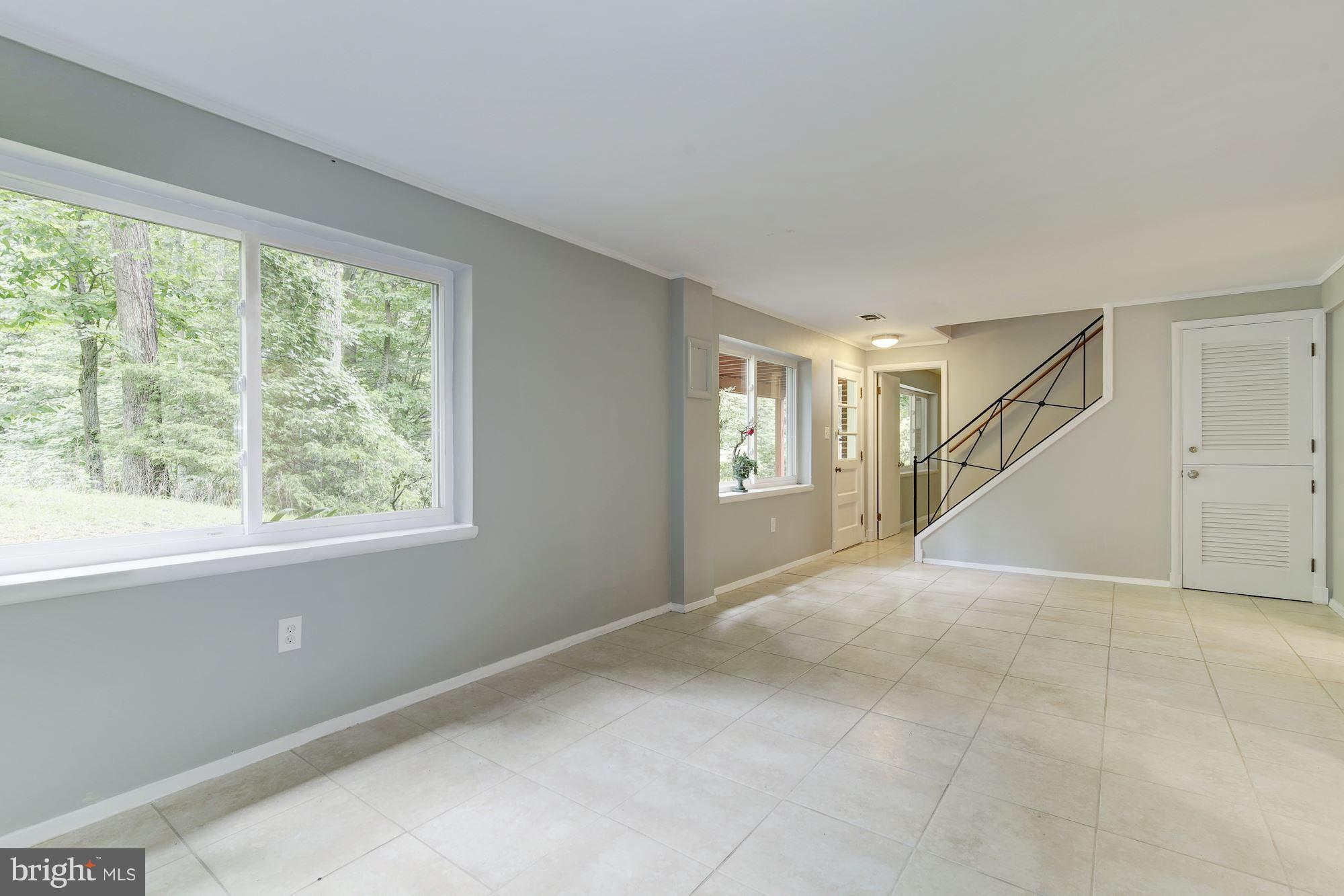 10709 Glenwild Road Silver Spring, MD 20901 - Photo 17 of 30 a view of an empty room with a window