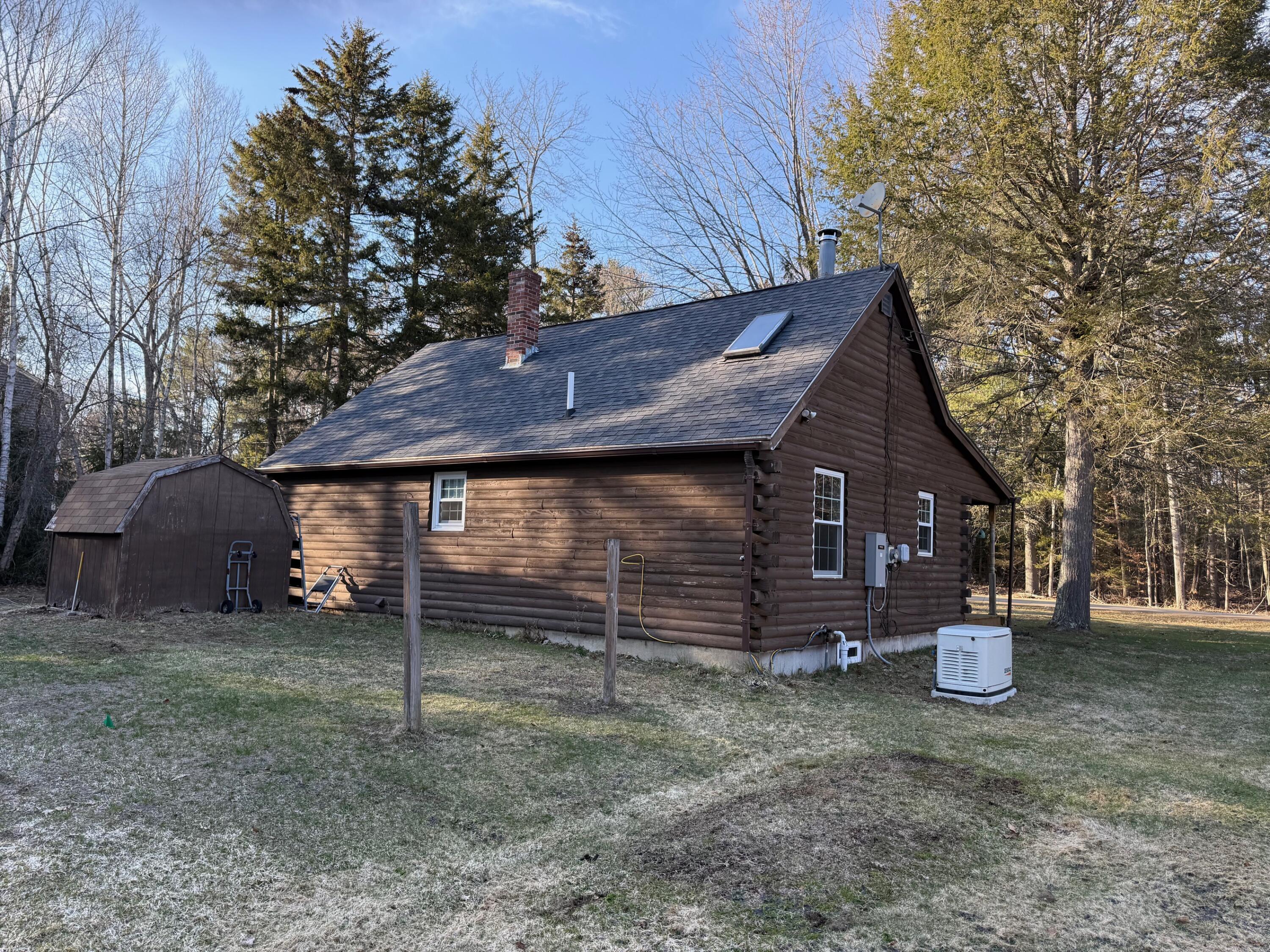 31 Range Road Brunswick, ME 04011 - Photo 2 of 4 31 Range - Exterior Back from Left