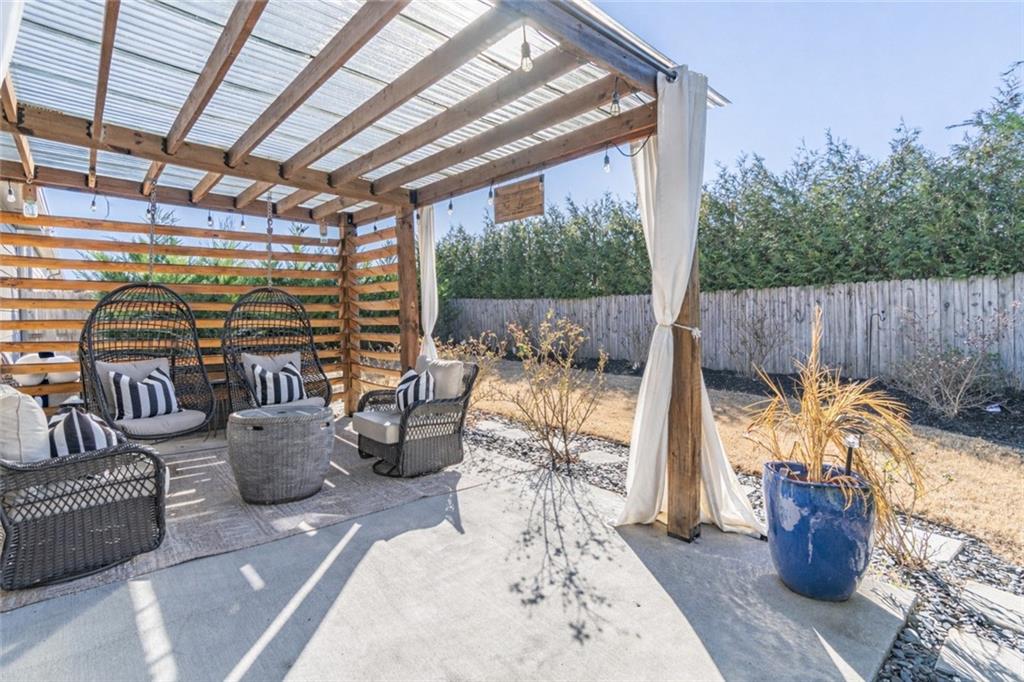 723 Independence Avenue Pendergrass, GA 30567 - Photo 16 of 22 a view of a patio filled with furniture