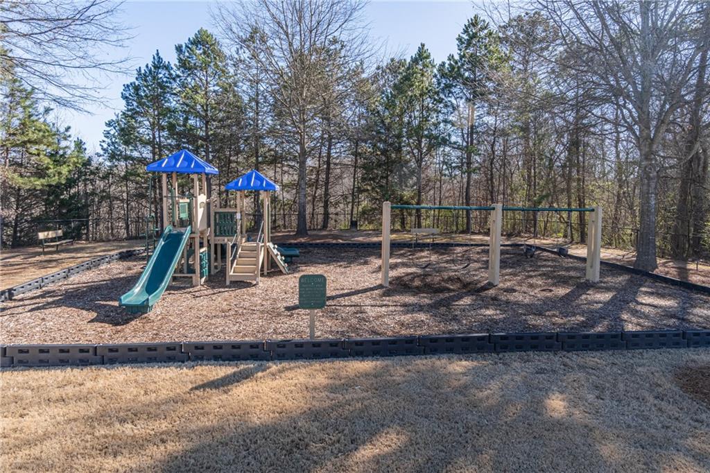 723 Independence Avenue Pendergrass, GA 30567 - Photo 21 of 22 a view of a park with swings