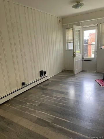 a view of an empty room and window