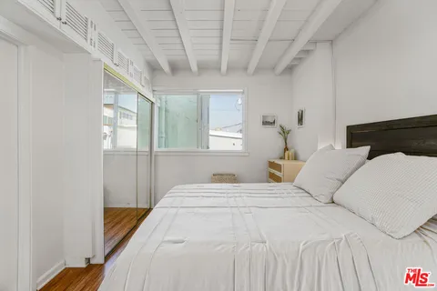 a bathroom with a sink a vanity and a bathtub