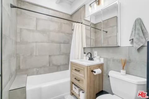 a bathroom with a sink and a shower