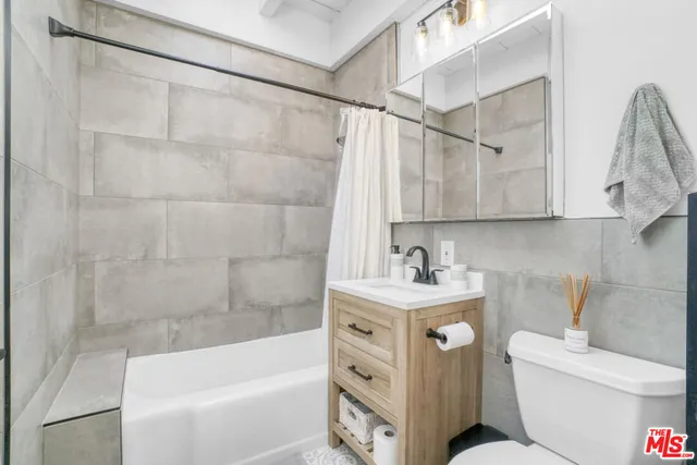 a bathroom with a sink and a shower