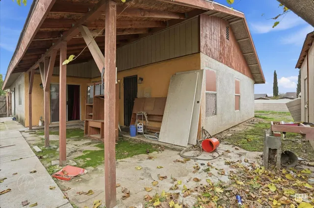 a view of an entryway door front of house