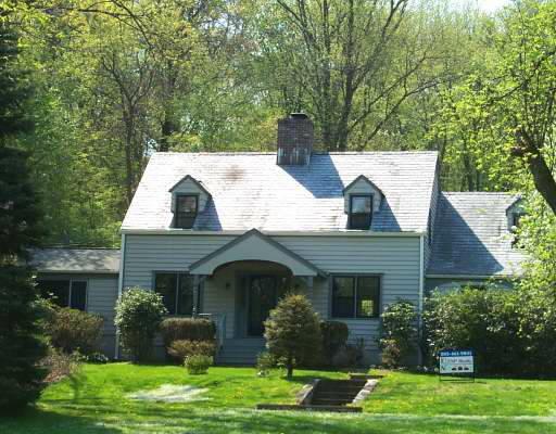 210 Woodbine Road Stamford, CT 06903 - Photo 1 of 1 a view of a yard in front of house