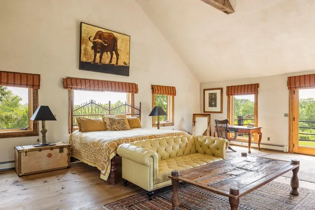 a front view of a house with a fountain