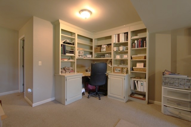 241 Starcrest Road Charlottesville, VA 22902 - Photo 24 of 29 a view of a workspace with furniture and cabinet
