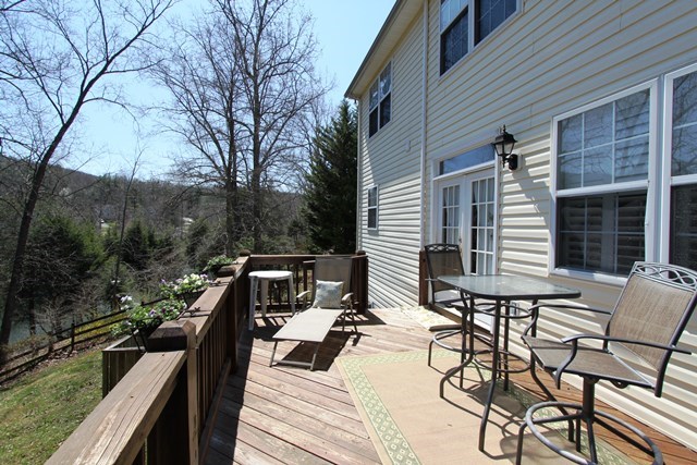 241 Starcrest Road Charlottesville, VA 22902 - Photo 27 of 29 a view of balcony with chairs and wooden fence