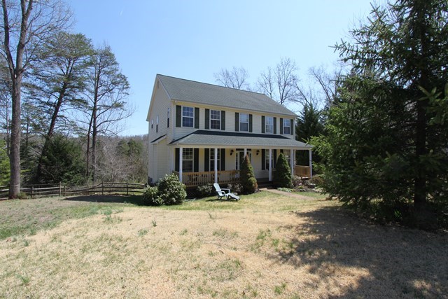 241 Starcrest Road Charlottesville, VA 22902 - Photo 29 of 29 a front view of a house with a yard