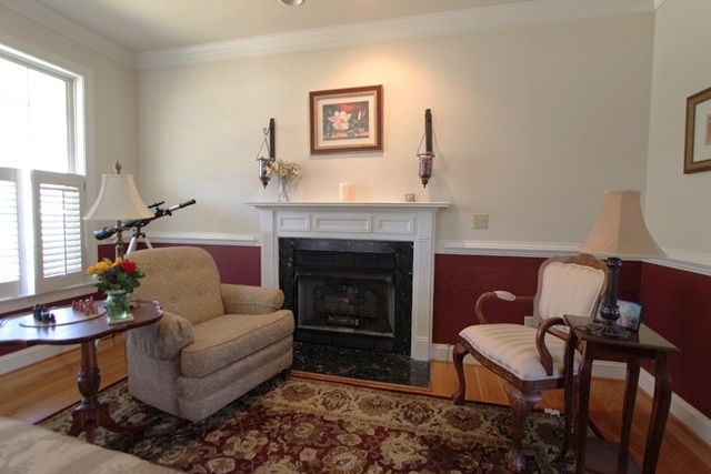 241 Starcrest Road Charlottesville, VA 22902 - Photo 4 of 29 a living room with furniture and a fireplace