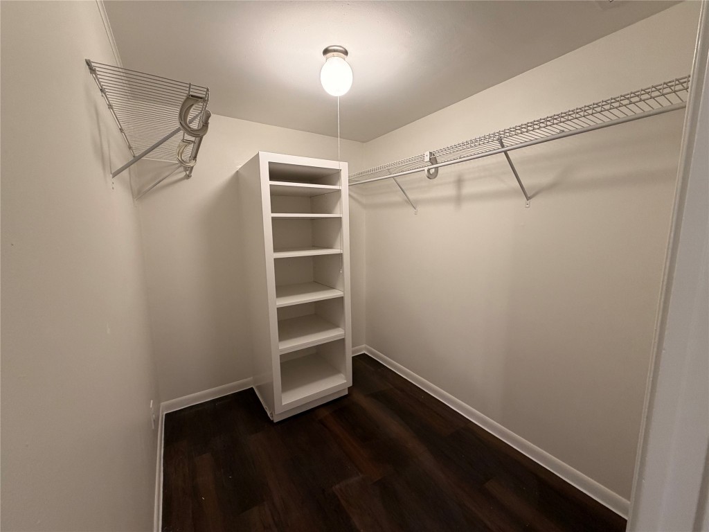3304 Red River Street, Unit 206 Austin, TX 78705 - Photo 7 of 16 a view of walk in closet with empty racks