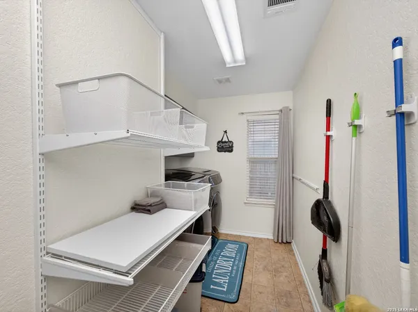 a room with storage and utility