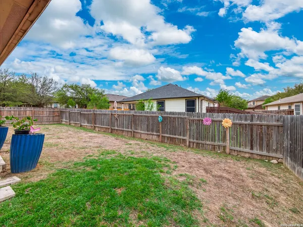 a view of a backyard with a garden